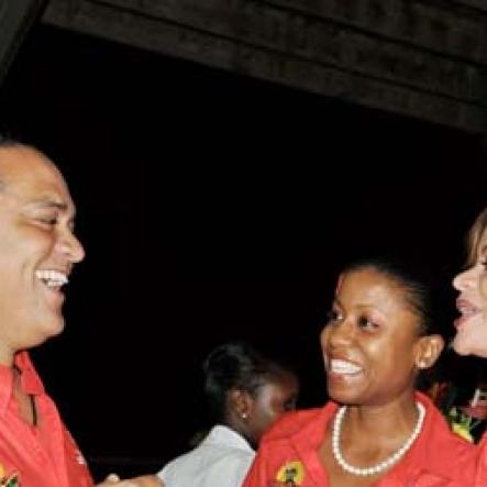 Photo byJanet Silvera
Summerfest Production's Robin Russell (left) has Digicel's Olive Lawson (right) and Olivia Tate in stitches during the Sumfest western Jamaica launch party at Pier One in Montego Bay on Thursday night