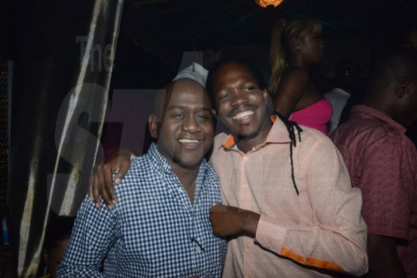 Winston Sill/Freelance Photographer
David "Sqeeze" Annakie Birthday Celebrations, held at Fiction Fantasy Nightclub, Market Place on Friday night August 22, 2014. Here are Duane Smith (left); and Damion Crawford (right).