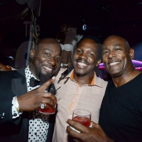 Winston Sill/Freelance Photographer
David "Sqeeze" Annakie Birthday Celebrations, held at Fiction Fantasy Nightclub, Market Place on Friday night August 22, 2014. Here are Garth Walker (left); Damion Crawford (centre); and Gregory Maine (right).