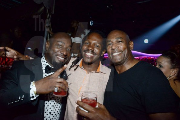 Winston Sill/Freelance Photographer
David "Sqeeze" Annakie Birthday Celebrations, held at Fiction Fantasy Nightclub, Market Place on Friday night August 22, 2014. Here are Garth Walker (left); Damion Crawford (centre); and Gregory Maine (right).