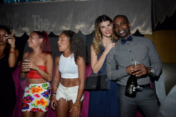 Winston Sill/Freelance Photographer
David "Sqeeze" Annakie Birthday Celebrations, held at Fiction Fantasy Nightclub, Market Place on Friday night August 22, 2014. Here are David "Sqeeze" Annakie (right); and his Lady friend Gabrielle Jankute (second right).