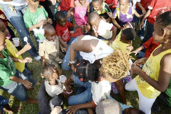 Rudolph Brown/Photographer
STAR Treat for Kids at Wray and Nephew, Spanish Town Road on Tuesday, December 11, 2012