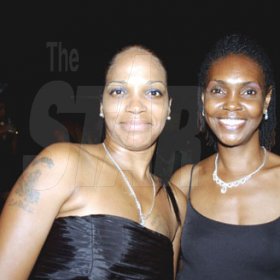 Winston Sill / Freelance Photographer
Capt. Errol Stewart celebrates  his 50th birthday with a grand swinging party, held at JDF Officers Club, Up Park Camp on Saturday night August 29, 2009. Here are Debbian Carney (left); and Paulette Wilson (right).