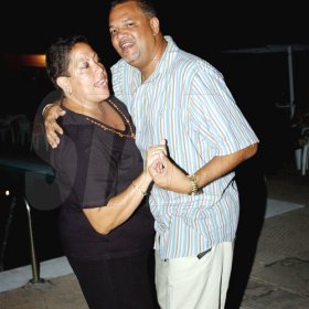 Winston Sill / Freelance Photographer
Capt. Errol Stewart celebrates  his 50th birthday with a grand swinging party, held at JDF Officers Club, Up Park Camp on Saturday night August 29, 2009. Here are James and Christine Wood.