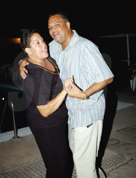 Winston Sill / Freelance Photographer
Capt. Errol Stewart celebrates  his 50th birthday with a grand swinging party, held at JDF Officers Club, Up Park Camp on Saturday night August 29, 2009. Here are James and Christine Wood.