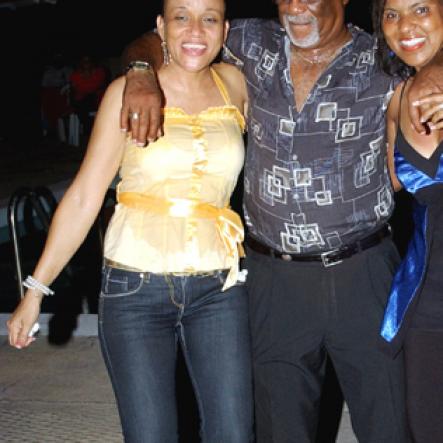 Winston Sill / Freelance Photographer
Capt. Errol Stewart celebrates  his 50th birthday with a grand swinging party, held at JDF Officers Club, Up Park Camp on Saturday night August 29, 2009. Here are Carol  Hooper (left); Maurice Foster (centre); and Kay Foster (right), Maurice's sister.