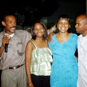 Winston Sill / Freelance Photographer
Capt. Errol Stewart celebrates  his 50th birthday with a grand swinging party, held at JDF Officers Club, Up Park Camp on Saturday night August 29, 2009. From left is Capt. Stewart  and sibblings Carol Martin, Sandra Stewart and Neville Stewart.