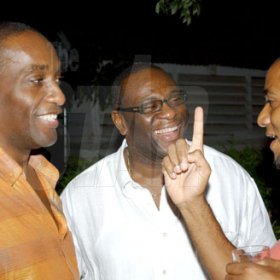 Winston Sill / Freelance Photographer
Capt. Errol Stewart celebrates  his 50th birthday with a grand swinging party, held at JDF Officers Club, Up Park Camp on Saturday night August 29, 2009. Here are Danovan Williams (left); Dwieght Moore (centre); and Kevin Sadler (right).
