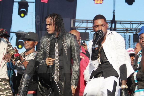 Anthony Minott, photos

Tommy Lee Sparta (left) and Gage performing on a crowded stage at Sting 2104