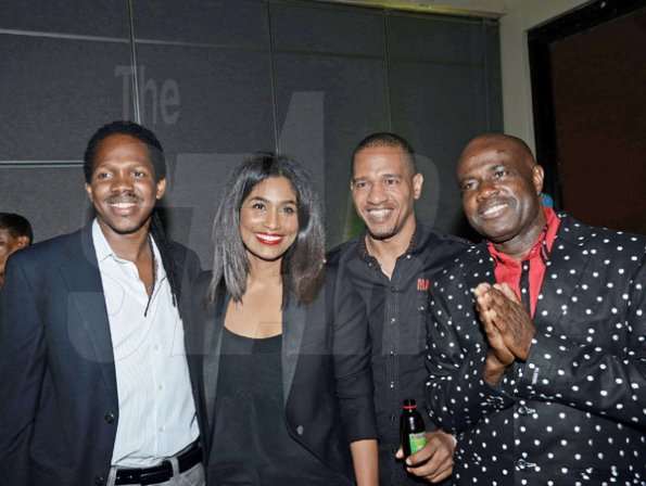 Winston Sill/Freelance Photographer
From left: Damion Crawford, state minister in the Ministry of Tourism and Entertainment, Lisa Hanna, minister of Youth and Culture, Gary Dixon, Wray and Nephew head of marketing and Supreme Promotions boss Isaiah Laing share the lens during the Bring The Sting Launch at the Pegasus Hotel on Monday.

ulture Supreme Promotions Limited and Downsound Records presents the Launch of Sting 30, held at the Jamaica Pegasus Hotel, New Kingston on Monday night November 25, 2013.