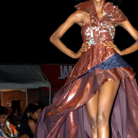 Winston Sill / Freelance Photographer
                                                                                   This model struts down the runway during Saint International Style Week International Mecca of Style Fashion Show, held at Fort Charles, Port Royal, recently.