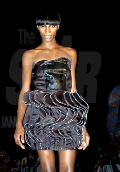 Winston Sill / Freelance Photographer
Jotasha Turnbull rocks a design by Les Campbell at Saint International Style Week International Mecca of Style Fashion Show, held at Fort Charles, Port Royal on Saturday night July 10, 2010.