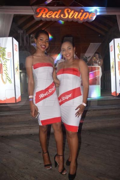 From left Kamoy Green and Christina McKenzie of Ace Promotions repping Red Stripe