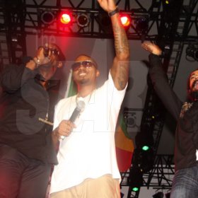 Publication: Daily Star
Photo by Noel Thompson

Bounty Killer (left), Amerivan rapper, 'Naz' (centre) and Damian 'Junior Gong' Marley bid farewell to the crowd at Reggae Sumfest International NIght One on Saturday (July 25, 2009) in Catherine Hall, Montego Bay.