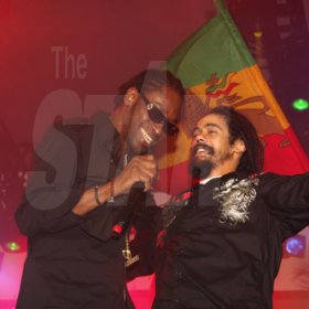 Publication: Daily Star
Photo by Noel Thompson

DJ Bounty Killer (left) and Damian 'Junior Gong' Marley team up on stage to entertain the audience, at Reggae Sumfest International NIght One on Saturday (July 25, 2009) in Catherine Hall, Montego Bay.