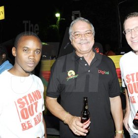 Winston Sill / Freelance Photographer
Summerfest Productions director, Robert Russell (centre), poses with the Red Stripe duo of Kamal Powell (left) and Volker Habig during the Reggae Sumfest launch at Devon House on Wednesday night.



















  June 29, 2011.