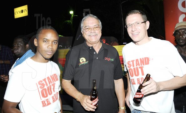 Winston Sill / Freelance Photographer
Summerfest Productions director, Robert Russell (centre), poses with the Red Stripe duo of Kamal Powell (left) and Volker Habig during the Reggae Sumfest launch at Devon House on Wednesday night.



















  June 29, 2011.
