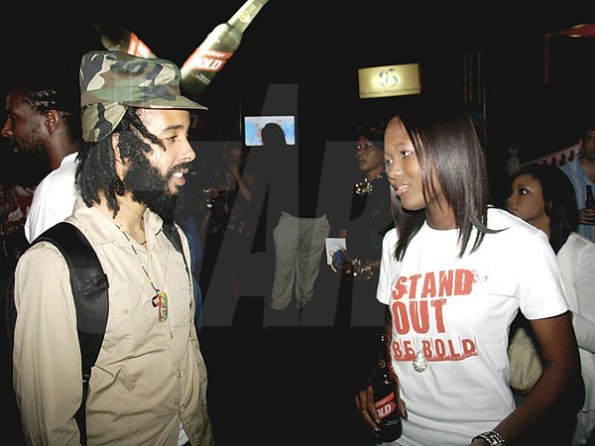 Contributed                                                                                                                                                                  Entertainer Protege (left) chats with Brand Manager for Red Stripe, Safia Cooper during the launch of Reggae Sumfest on Wednesday at Devon House.