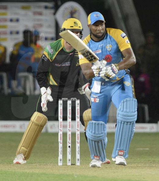Ian Allen/PhotographerKeiron Pollard playing for the St. Lucia Stars versus the Jamaica Tallawahs during the Caribbean Premier League (CPL) T/20 cricket match at Sabina Park on Tuesday.Wicket Keeper Glen Phillips looks on.