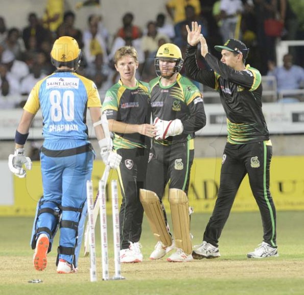 Ian Allen/PhotographerRoss Taylor (right), Glen Phillips (second right) and Adam Zampa (second left)Jamaica Tallawahs team mates celebrate the dismissal of Chapman(left) from the St.Lucia Stars during their Caribbean Premier League (CPL) T/20 cricket match at Sabina Park on Tuesday.