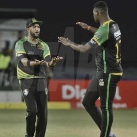 Ian Allen/PhotographerOshane Thomas celebrates with his team mates during the Jamaica Tallawahs vs St. Lucia Stars Caribbean Premier League (CPL) T/20 cricket match at Sabina Park on Tuesday.