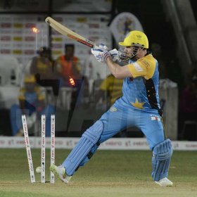 Ian Allen/PhotographerMitchell McClenaghan is bowled by Oshane Thomas during the Jamaica Tallawahs versus St.Lucia Stars at Sabina Park on Tuesday.