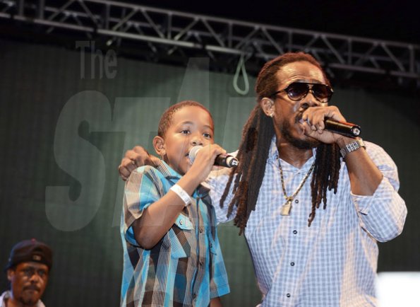 Winston Sill/Freelance Photographer
Wayne Marshall (right) and his son Giomar perform 'Stupid Money' during Tessanne Chin's Home Coming Concert on the Waterfront, Ocean Boulevard on Sunday night.




 January 12, 2014.