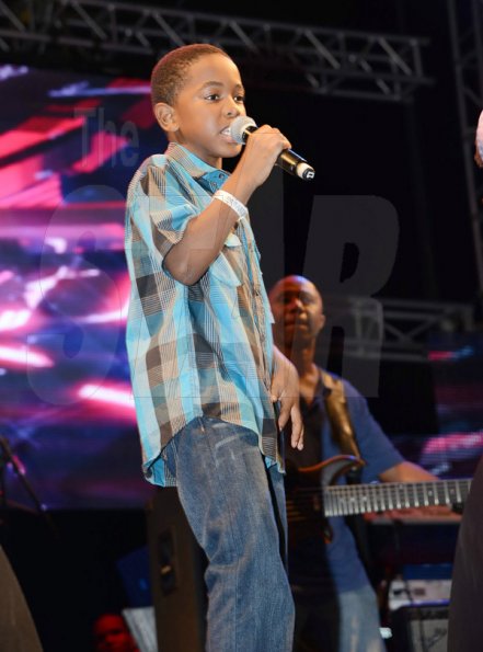 Winston Sill/Freelance Photographer
Giomar Mitchell, son of Wayne Marshall, performs his collaboration with his father, Stupid Money, on Sunday night.




 Tessanne Chin Home Coming Concert, held on the Waterfront, Ocean Boulevard on Sunday night January 12, 2014.