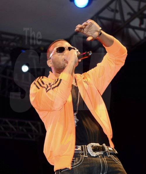 Winston Sill/Freelance Photographer
Assassin raises an arm to the crowd during Tessanne Chin's Homecoming Concert on the Waterfront, Ocean Boulevard on Sunday night.






 January 12, 2014.