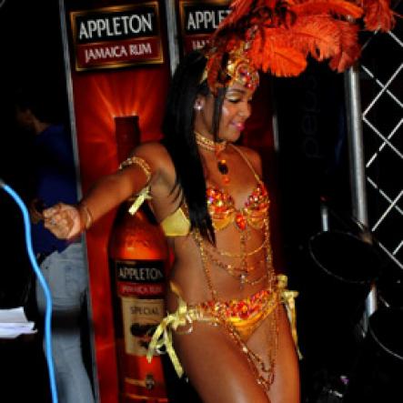 Winston Sill / Freelance Photographer
Bacchanal Jamaica and Appleton Rum presents the 2013 Band Launch Fete, featuring the 2013 costumes, held at Mas Camp, Stadium North on Friday night December 7, 2012.