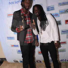 Anthony Minott/Freelance photographer                                                                                                                     Producer of the Year, Markus Myrie (left) pose with I-Octane who gave an energetic performance at The STAR Awards last night.