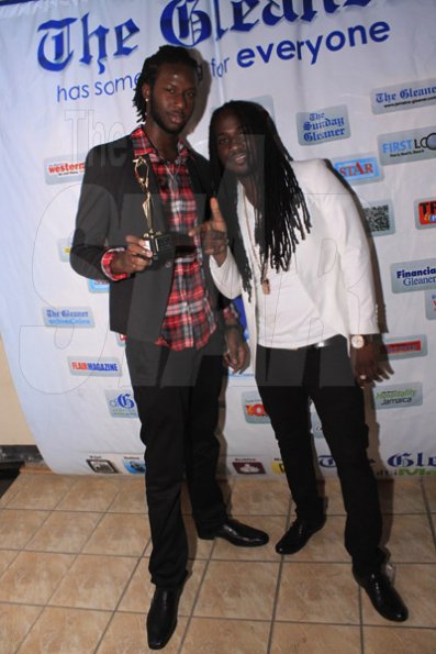 Anthony Minott/Freelance photographer                                                                                                                     Producer of the Year, Markus Myrie (left) pose with I-Octane who gave an energetic performance at The STAR Awards last night.