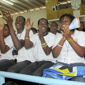 Ian Allen/Staff Photographer
Representatives from Barbados cheers during the  Antilles Episcopal Conference(AEC) 2009 Opening Ceremony at St. Georges College in Kingston on tuesday.