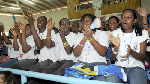 Ian Allen/Staff Photographer
Representatives from Barbados cheers during the  Antilles Episcopal Conference(AEC) 2009 Opening Ceremony at St. Georges College in Kingston on tuesday.