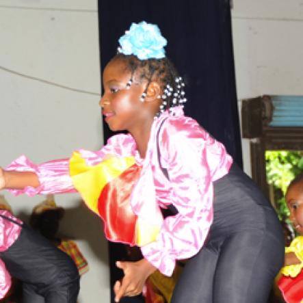 Ian Allen/Staff Photographer
Jessie Repoll Primary School Dancers dancing up a storm during the Antilles Episcopal Conference(AEC) Opening Ceremony at St. Georges College in Kingston on tuesday.