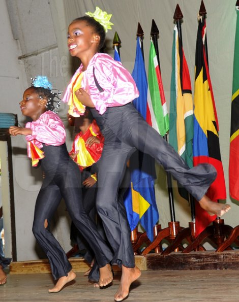 Ian Allen/Staff Photographer
Jessie Repoll Primary School Dancers dancing up a storm during the Antilles Episcopal Conference(AEC) Opening Ceremony at St. Georges College in Kingston on tuesday.