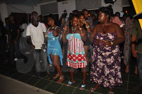 A section of the audience watching the fashion show.