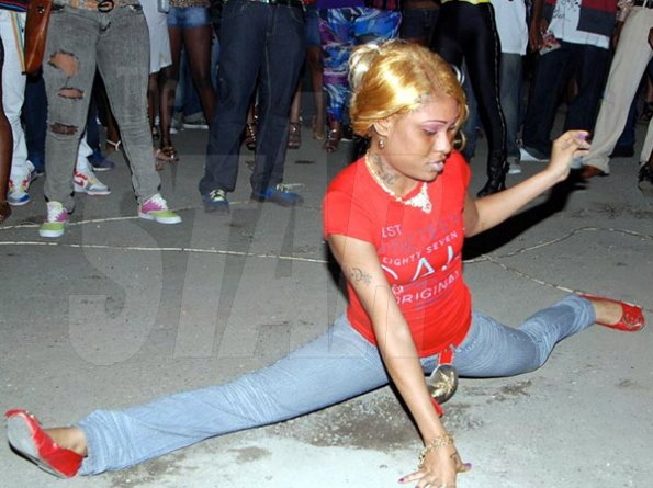 Photos by Milton Raynor                                                                                                                                             This female patron shows off her flexibility on the dance floor.