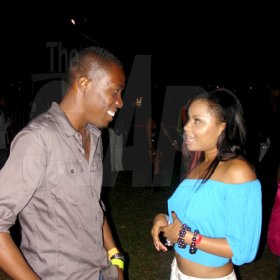 Contributed
Gareth Geddes, Brand Manager for Guinness chats with dancehall diva Cecille during the Bolt party 9.58 at Richmond Estate on Saturday night.