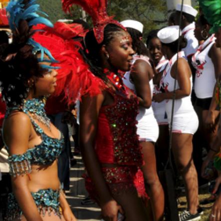 Winston Sill / Freelance Photographer
University of the West Indies (UWI) Carnival  Road Parade, with the theme "Birds of a Feather", held on the Ring Road, Mona Campus on Saturday March 19, 2011.