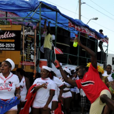 Winston Sill / Freelance Photographer
University of the West Indies (UWI) Carnival  Road Parade, with the theme "Birds of a Feather", held on the Ring Road, Mona Campus on Saturday March 19, 2011.