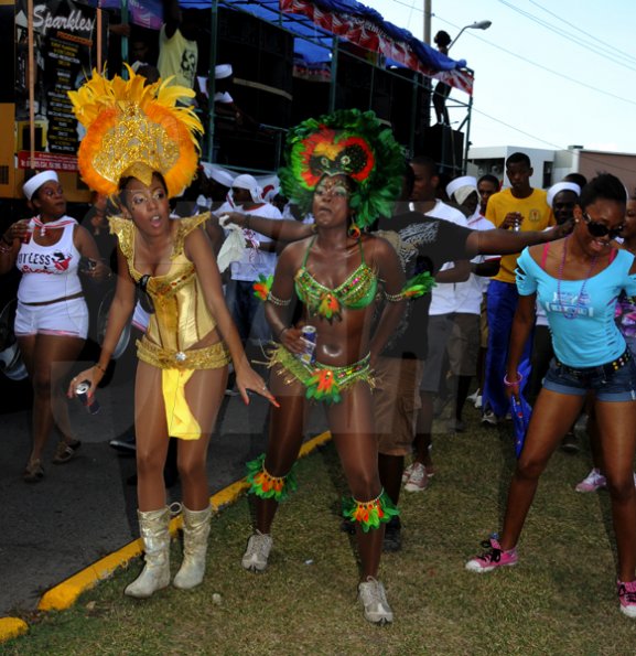 Winston Sill / Freelance Photographer
University of the West Indies (UWI) Carnival  Road Parade, with the theme "Birds of a Feather", held on the Ring Road, Mona Campus on Saturday March 19, 2011.