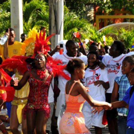 Winston Sill / Freelance Photographer
University of the West Indies (UWI) Carnival  Road Parade, with the theme "Birds of a Feather", held on the Ring Road, Mona Campus on Saturday March 19, 2011.