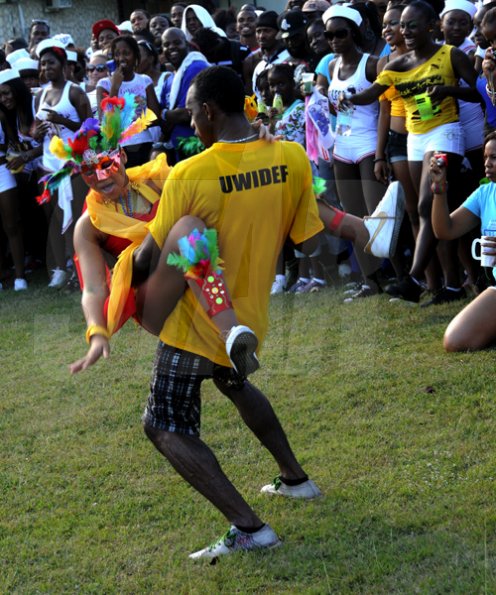 Winston Sill / Freelance Photographer
University of the West Indies (UWI) Carnival  Road Parade, with the theme "Birds of a Feather", held on the Ring Road, Mona Campus on Saturday March 19, 2011.