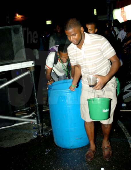 Winston Sill / Freelance Photographer
                                                                              Bring out the water!                                                                                                                                                                                                                                        Smirnoff and Heineken in association with Island Mas presents the official and original Water Party, held at Sagicor Car Park, New Kingston on Saturday night April 10, 2010.