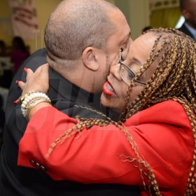 Rudolph Brown/Photographer
Dr.Denise Chevannes, (right) Executive Director, National Family Planning Board(NFPB) greets Dane Lewis, President of JFLAG at the World AIDS Day breakfast Forum "Health for All: Towards A More Integrated Response to HIV Prevention, Treatment and Care, at the Knutsford Court Hotel on Tuesday, December 1, 2015