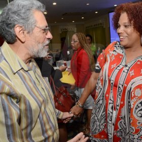 Rudolph Brown/Photographer
Taitu Heron, National Programme Coordinator, Jamaica of UN Women in discussion with Professor Peter Figueroa, of Public Health, University of the West Indies at the World AIDS Day breakfast Forum "Health for All: Towards A More Integrated Response to HIV Prevention, Treatment and Care, at the Knutsford Court Hotel on Tuesday, December 1, 2015