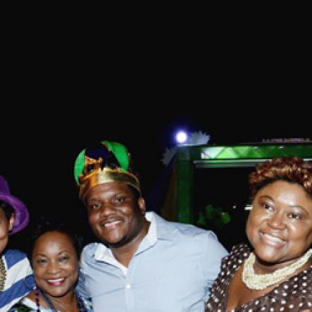 Winston Sill/Freelance Photographer
J. Wray and Nephew host Yardi Gras 2014 the annual Media Party, held at Countryside Club, Courtney Walsh Drive on Tuesday night March 18, 2014. Here are Naomi  Garrick (left); Sophia Bernard-Fairman (second left);       Colin Smith (centre); Debbie-Ann Spence (second right); and Greta Bogues (right).