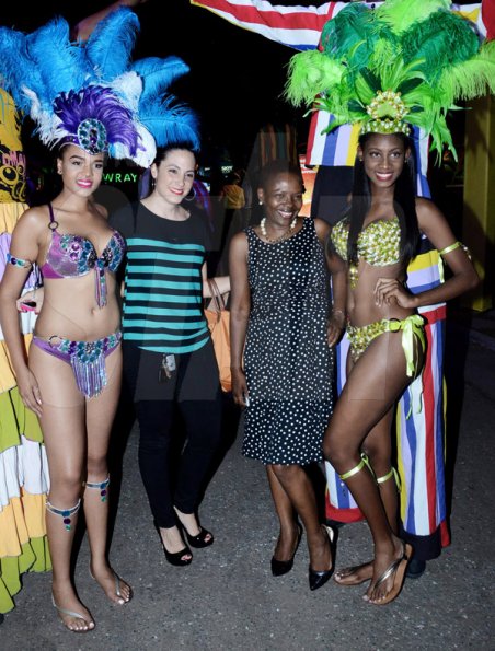 Winston Sill/Freelance Photographer
J. Wray and Nephew host Yardi Gras 2014 the annual Media Party, held at Countryside Club, Courtney Walsh Drive on Tuesday night March 18, 2014. Here are Safia King (left); Kimberly Foote (second left); Nordia craiog (second right); and Ashlie Bennett (right).