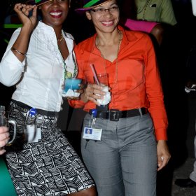 Winston Sill/Freelance Photographer
J. Wray and Nephew host Yardi Gras 2014 the annual Media Party, held at Countryside Club, Courtney Walsh Drive on Tuesday night March 18, 2014. Here are Michaela Francis (left); and Chana Hay (right).
